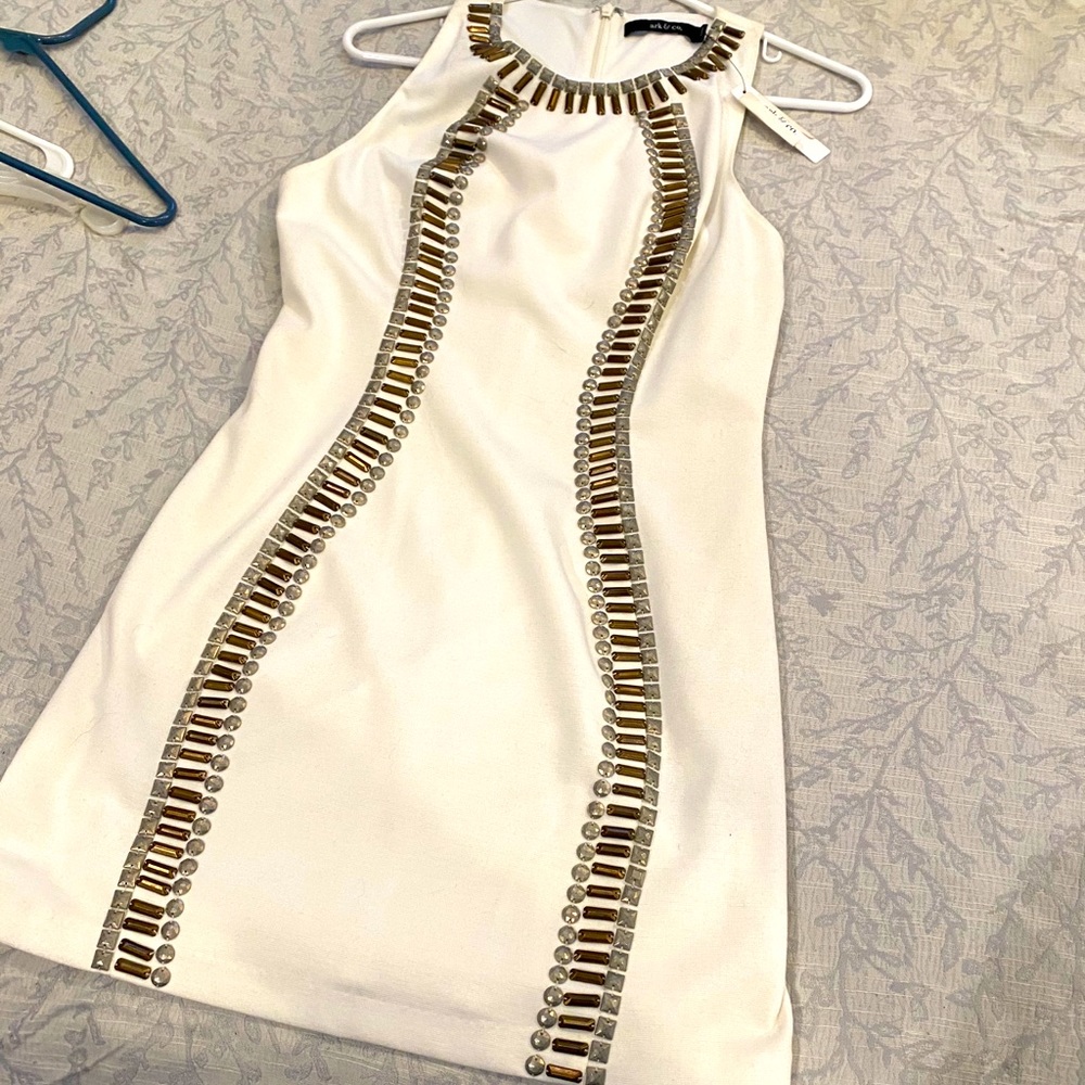 White sleeveless dress with metal detail